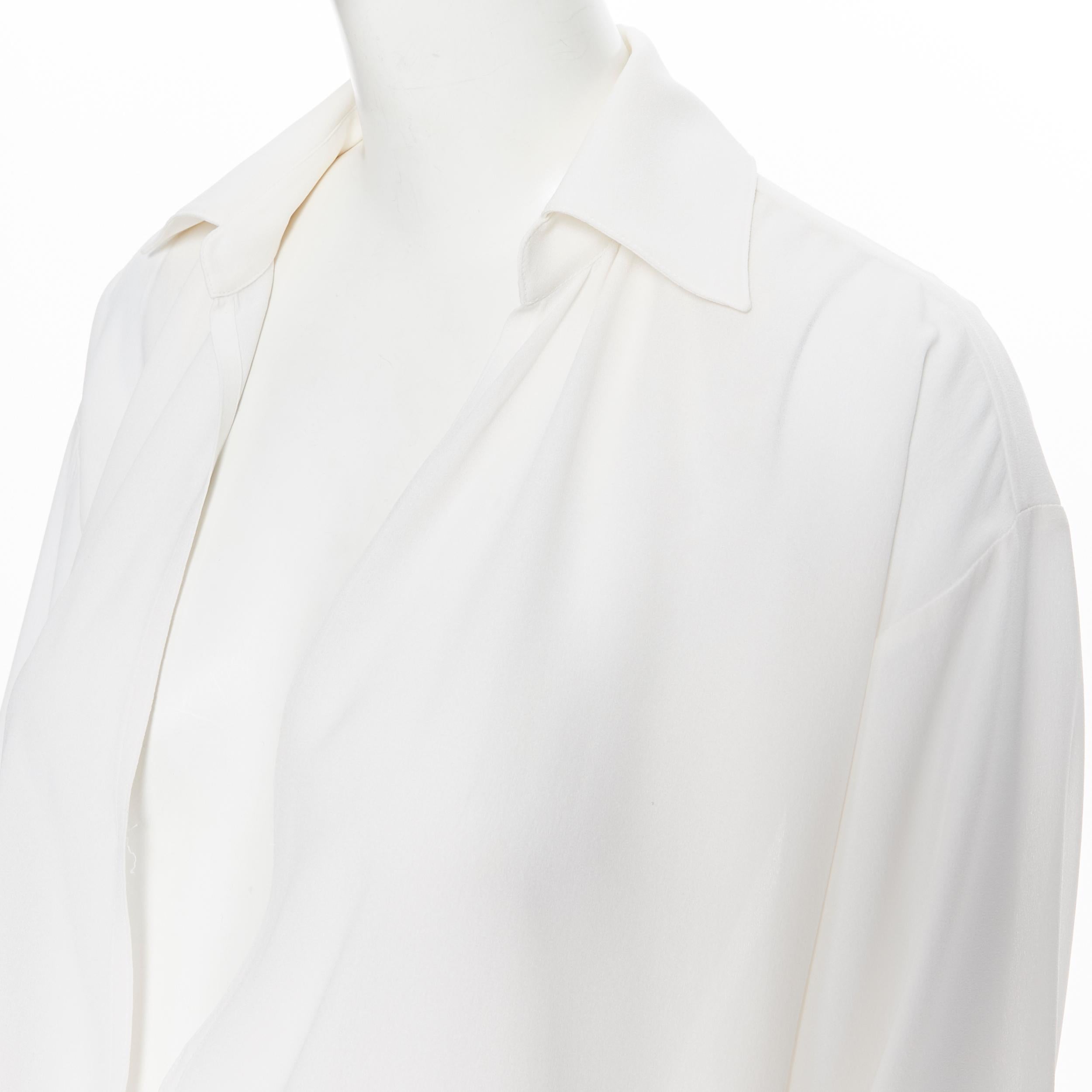 MICHAEL KORS COLLECTION 100% silk  white foldover open front draped sihrt XS
Brand: Michael Kors
Designer: Michael Kors
Model Name / Style: Silk blouse
Material: Silk
Color: White
Pattern: Solid
Extra Detail: 100% silk. Spread collar. Draped