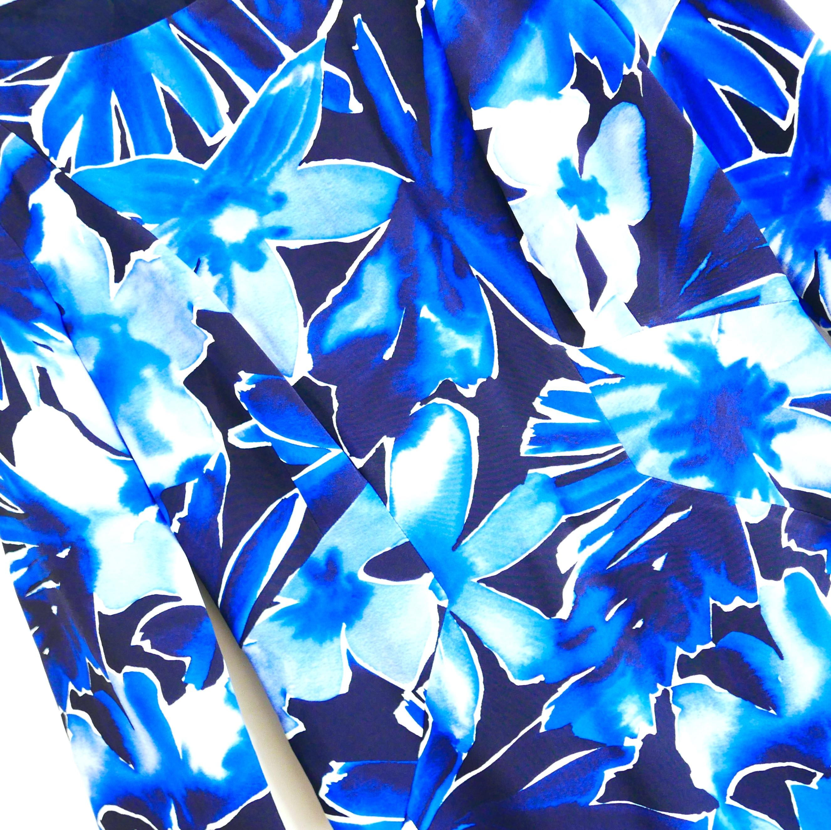 Absolutely gorgeous Michael Kors Collection floral print dress from the Spring 2018 collection. Bought for £1750 and new with tags. Made from smooth, stretchy rayon and elastane crepe with a vivid electric blue exotic floral print. Superbly tailored