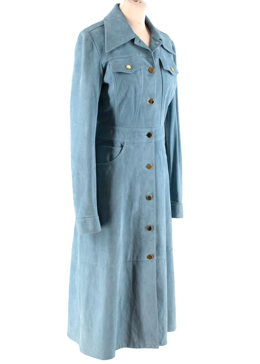 Michael Kors Collection Blue Suede Trench Coat Dress

- Made of super soft lambskin suede 
- Denim jacket inspired details 
- Gorgeous light blue hue 
- Pockets to the front 
- Gold tone hardware 
- Buttoned cuffs 
- Timeless elegant design
