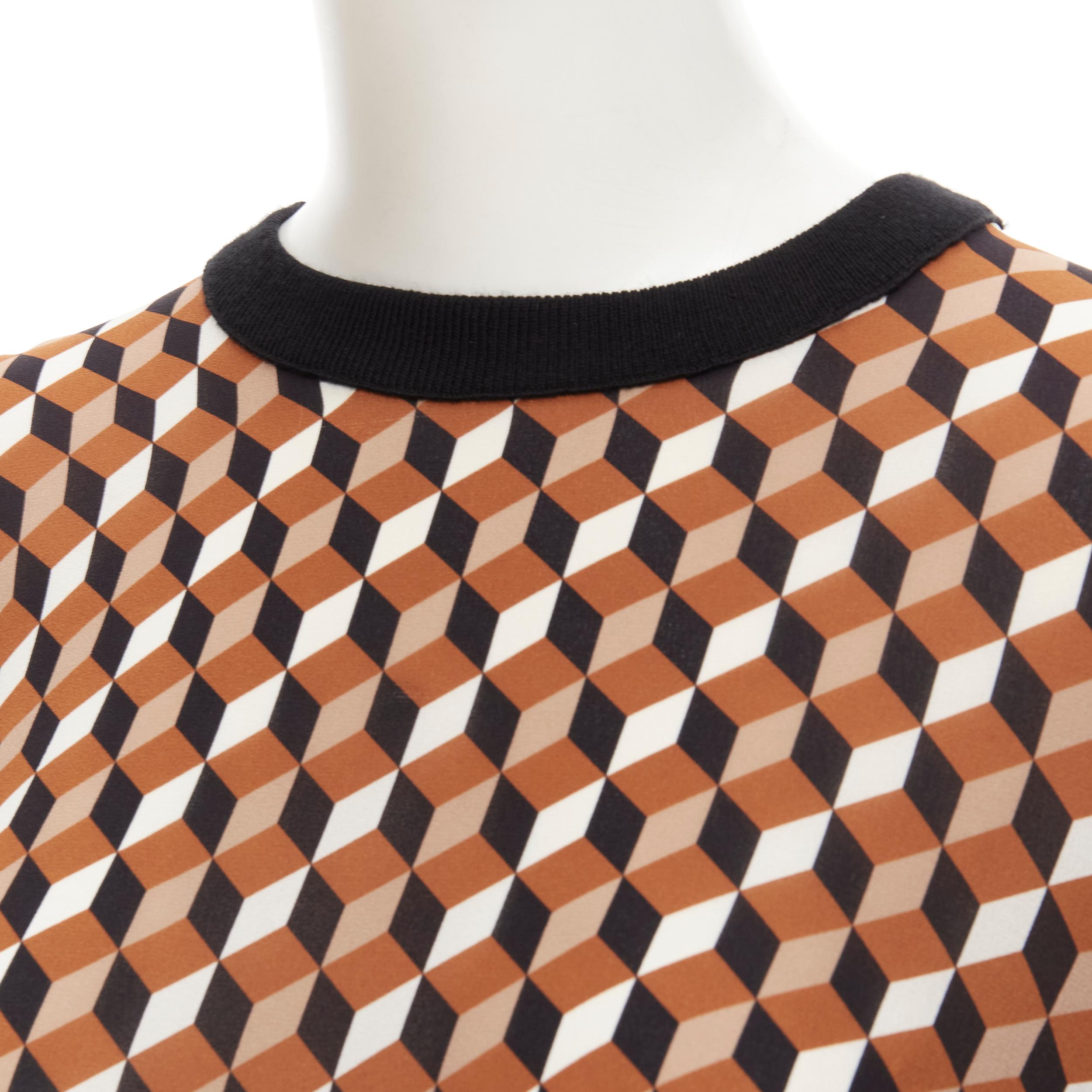 MICHAEL KORS COLLECTION brown merino wool cube print silk panel swaeter XS 
Reference: LNKO/A01950
Brand: Michael Kors Collection 
Designer: Michael Kors 
Material: Wool 
Color: Brown 
Pattern: Geometric 
Extra Detail: Striped ribbed cuff and hem.