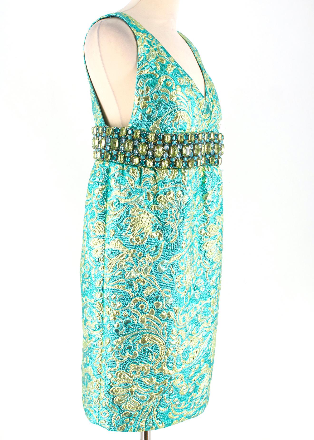 Michael Kors Collection Crystal Embellished Metallic Brocade Dress

tonal blue and green brocade;
concealed hook and zip fastening at back;
heavily embellished;
non-stretchy fabric;
Made in Italy

Please note, these items are pre-owned and may show