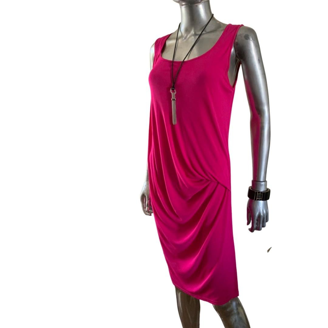 Michael Kors really knows how to drape dress. This shocking pink European jersey draped sleeveless dress is from Michael Kors Collection. Made in Italy. These dresses are made in the same Italian factory as all the leading Italian brands. This dress