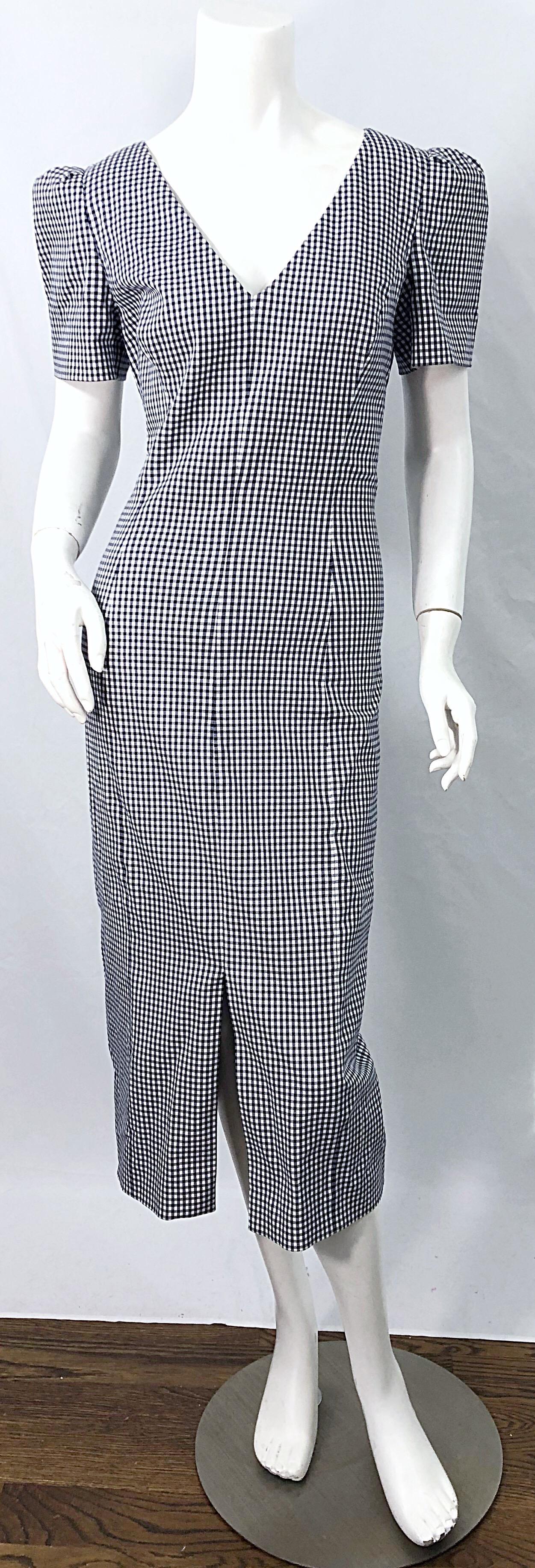 Chic MICHAEL KORS COLLECTION navy blue and white gingham checkered puff sleeve nautical dress ! 
98% Cotton 2% Spandex. 
Features allover navy blue and white gingham throughout the entire dress. Puff sleeves add just the right amount of volume.