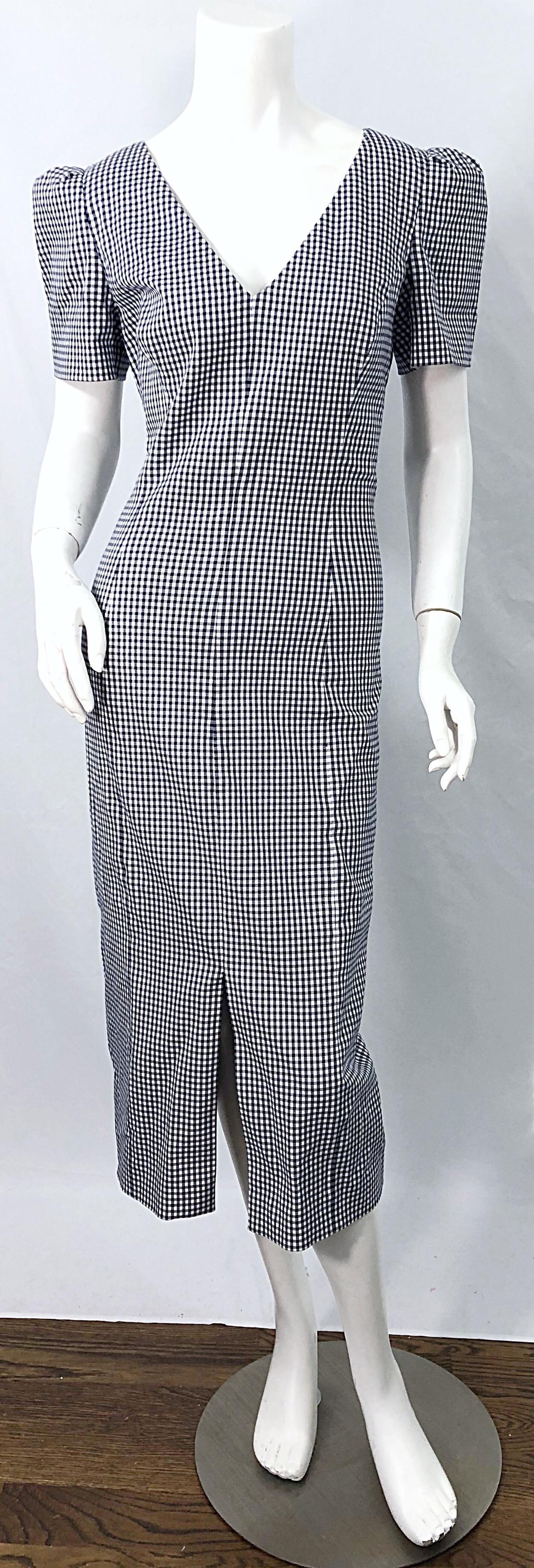 Chic MICHAEL KORS COLLECTION Vestido náutico de manga abullonada con estampado de cuadros en azul marino y blanco. 
98% Algodón 2% Elastano. 
Con guinga azul marino y blanca por todo el vestido. Las mangas abullonadas añaden el volumen justo.