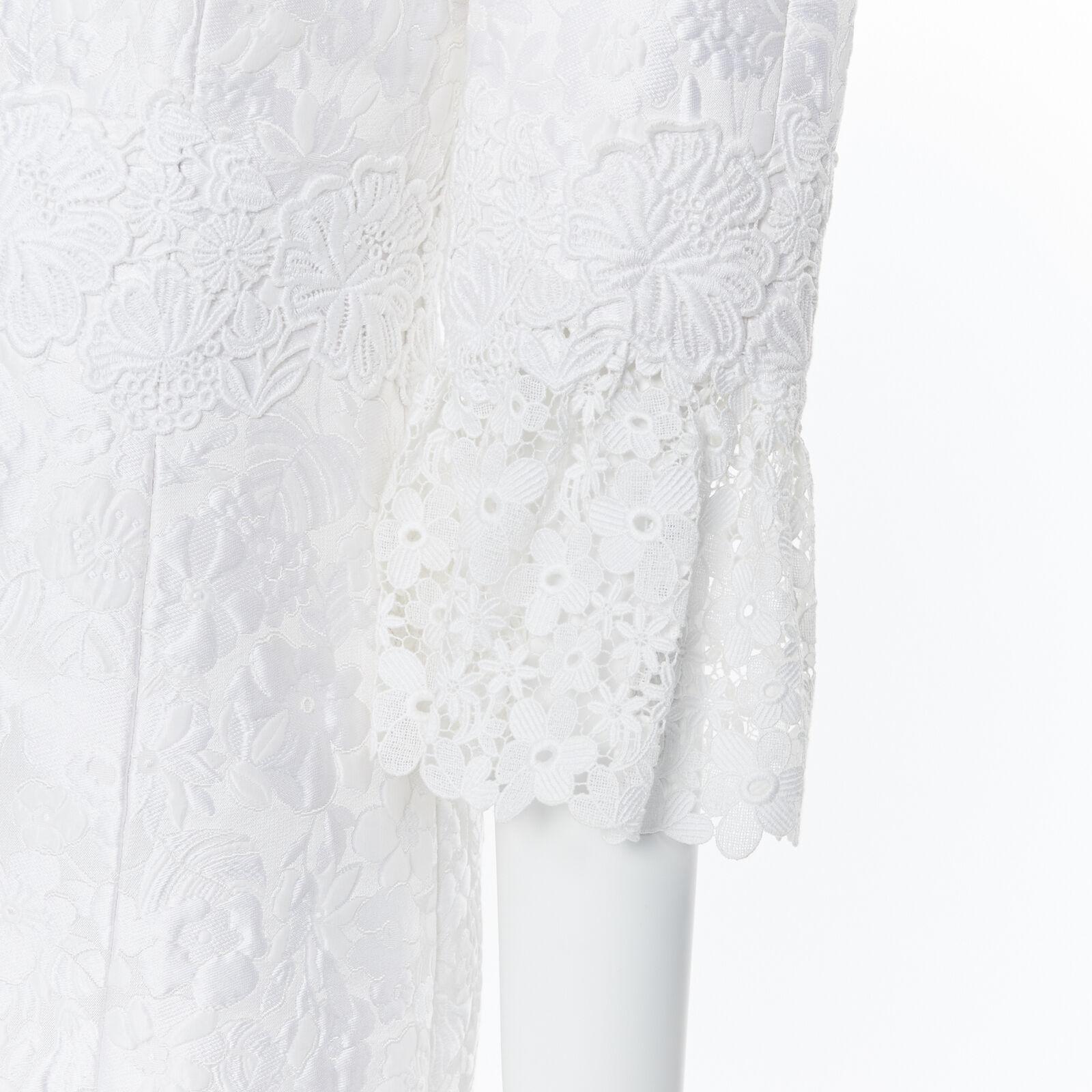 MICHAEL KORS COLLECTION white floral cloque lace trimmed 3/4 sleeve dress US0
Reference: LNKO/A01522
Brand: Michael Kors
Material: Cotton
Color: White
Pattern: Floral
Closure: Zip
Extra Details: Lace trimming at sleeves and along waist.
Made in: