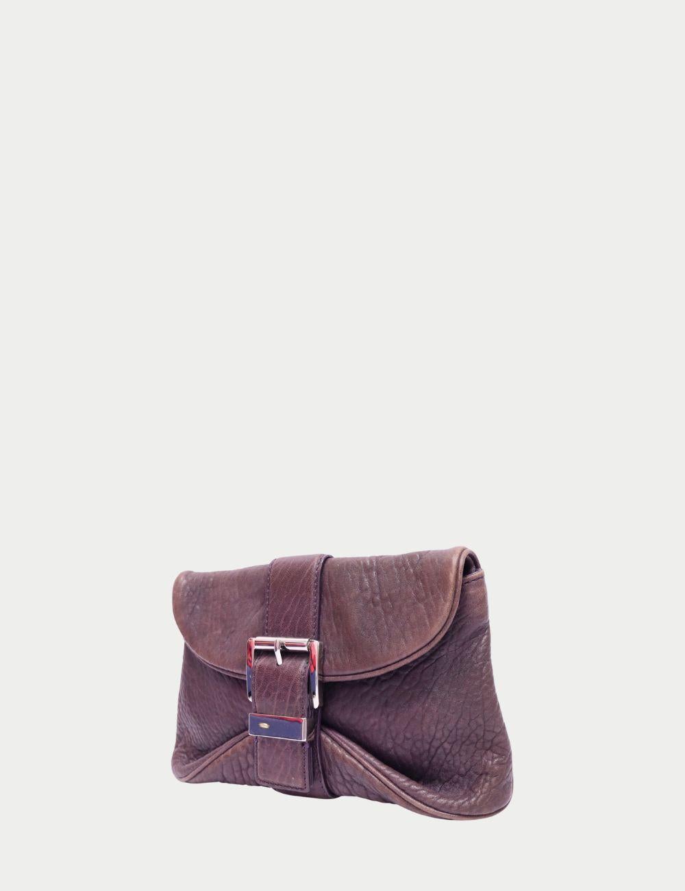 Michael Kors Brown Textured Leather Clutch with Buckle Detail


Compact, refined, and designed to stand out—this Michael Kors brown clutch is crafted from richly textured leather with a unique oversized buckle detail at the front. The structured