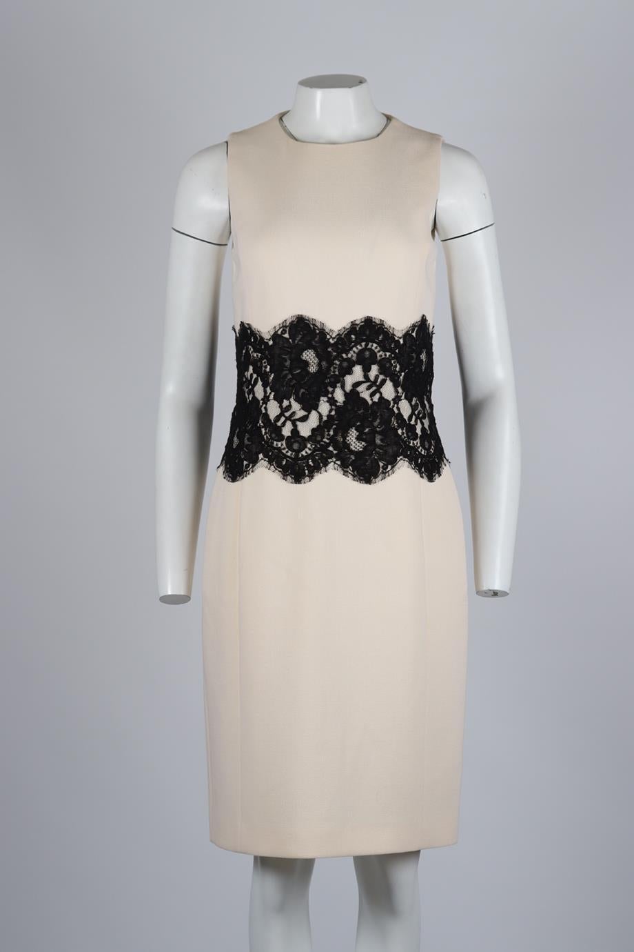 Michael Kors Lace Paneled Wool Blend Dress. Cream and black. Sleeveless. Crewneck. Zip fastening - Back. 99% Wool, 1% spandex; lining: 56% rayon, 44% polyester. US 8 (UK 12, FR 40, IT 44). Bust: 35 in. Waist: 30 in. Hips: 40 in. Length: 40 in.