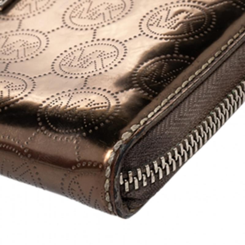 Michael Kors Cartera con cremallera Jet Set de piel dorada metalizada 1