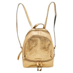 Michael Kors Zaino Rhea piccolo in pelle goffrata pitonata oro metallizzato