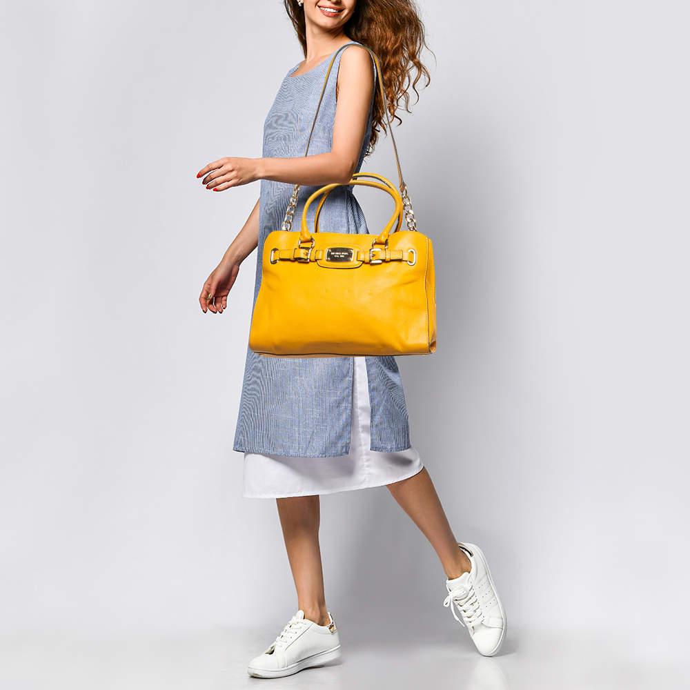 This alluring tote bag for women has been designed to assist you on any day. Convenient to carry and fashionably designed  the tote is cut with skill and sewn into a great shape. It is well equipped to be a reliable accessory.