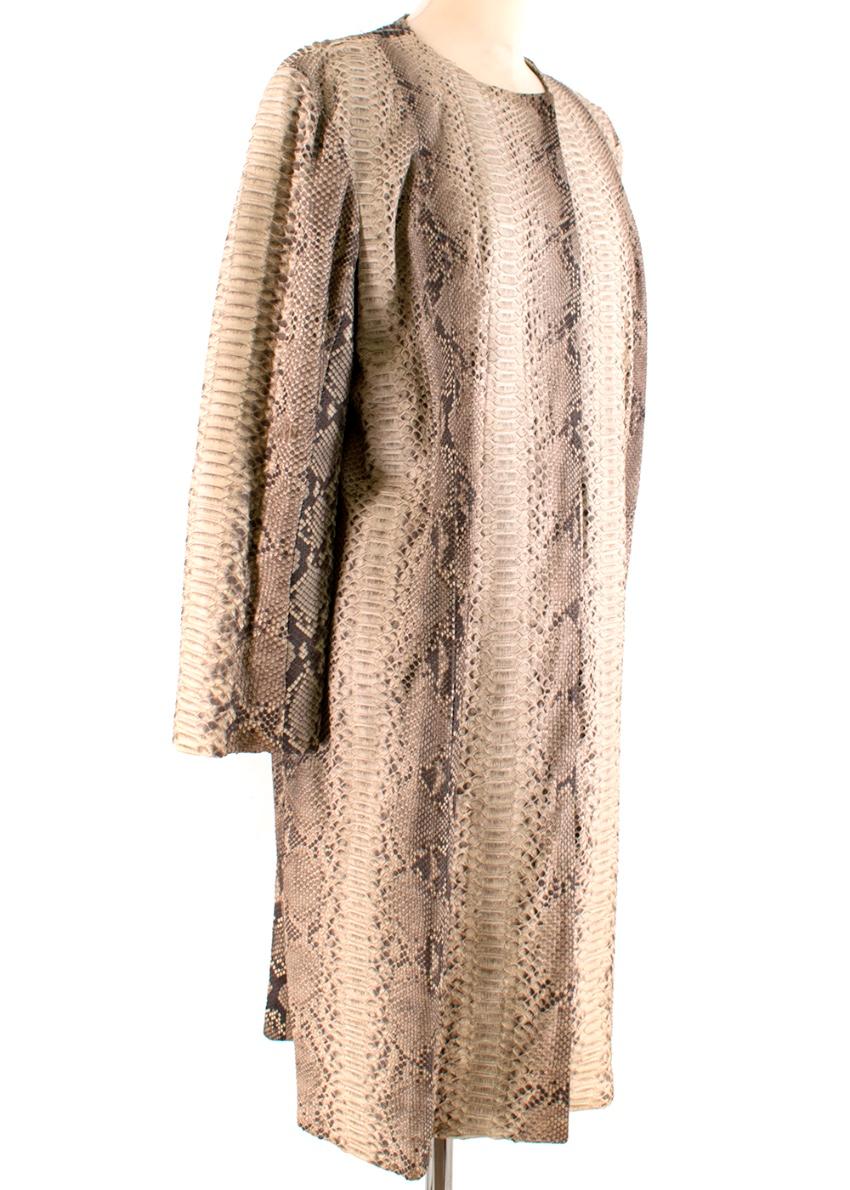 Michael Kors - Taupe Python Leather Longline Coat

- round neck 
- concealed snap button fastening 
- longline
- fully lined
- mid weight

- 100% python leather, lining 100% silk
- specialist clean
- made in USA

Please note, these items are
