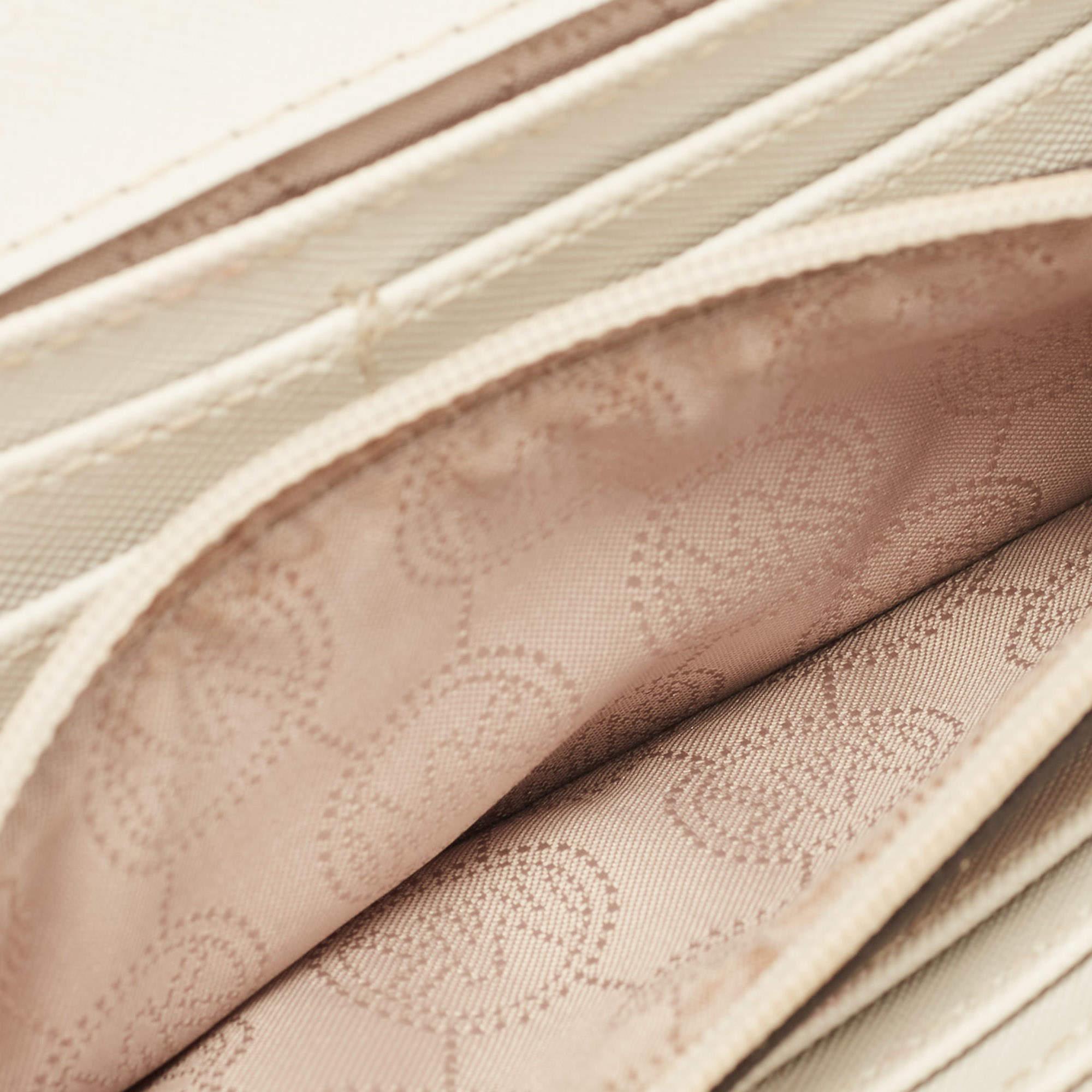 Blanc Michael Kors - Portefeuille continental à rabat en toile enduite Signature blanc cassé en vente