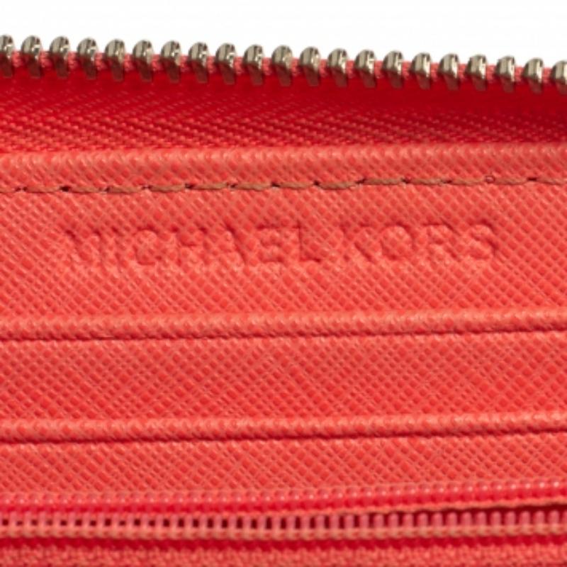 Women's Michael Kors Pink Leather Zip Around Wristlet Wallet For Sale