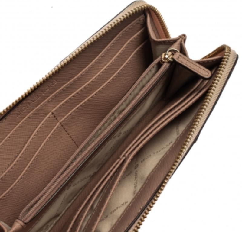 Michael Kors Pink Signature Leather Zip Around Wallet In Fair Condition For Sale In Dubai, Al Qouz 2