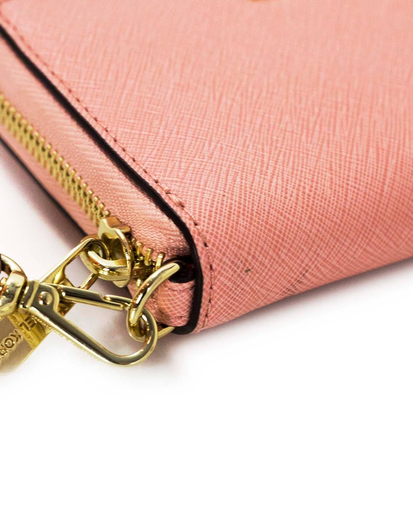 Michael Kors Pink Zippy Wallet/Wristlet In Excellent Condition In New York, NY