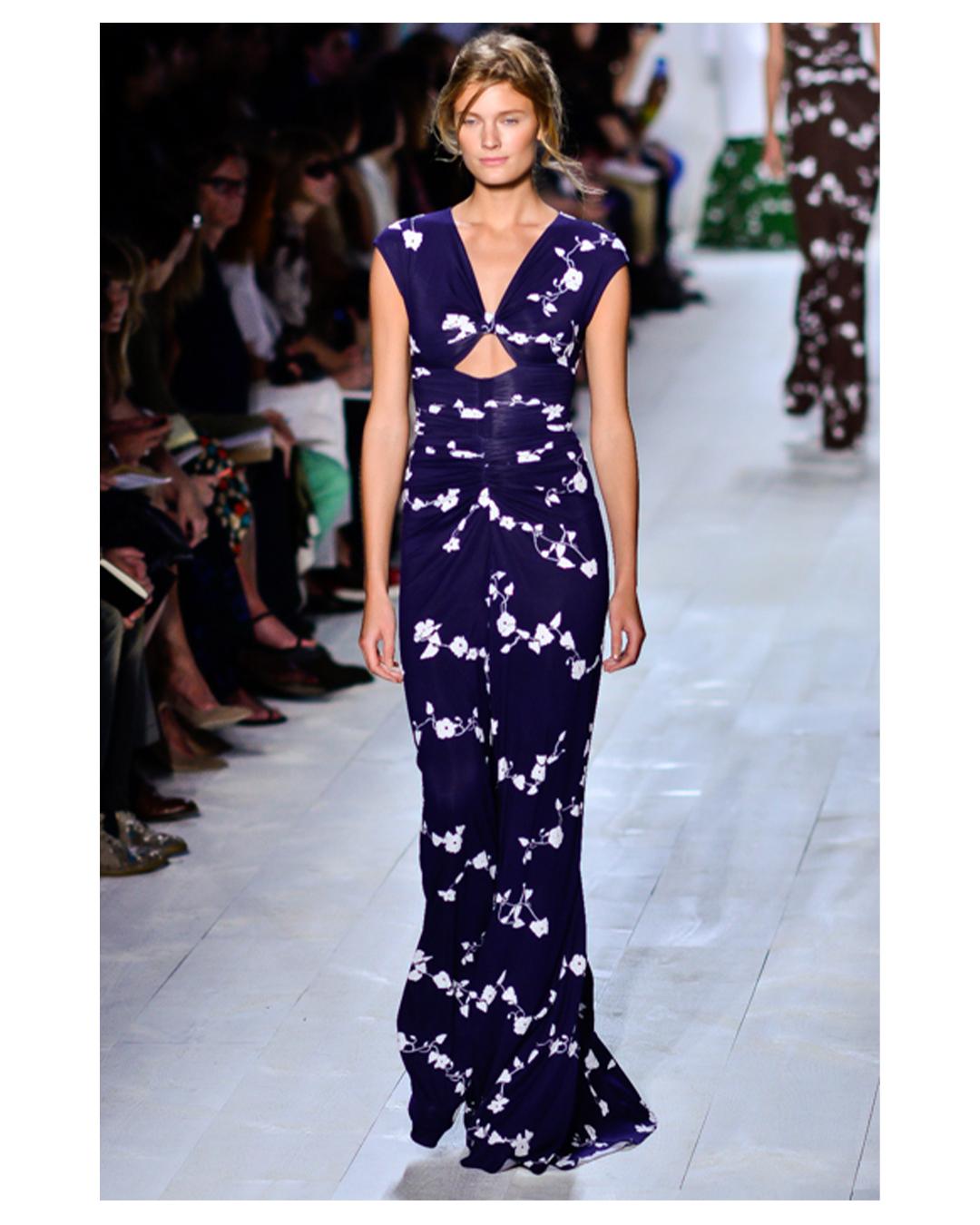 LOVE LALI Vintage

Michael Kors Spring 2014 Asian inspired dress
Blue with white floral print 
V neckline with a keyhole cut out at bust
Sleeveless   
Ruched cinched in waist
Cut out back
Stretch fabric 
Hooks at the back of the neck
Concealed back