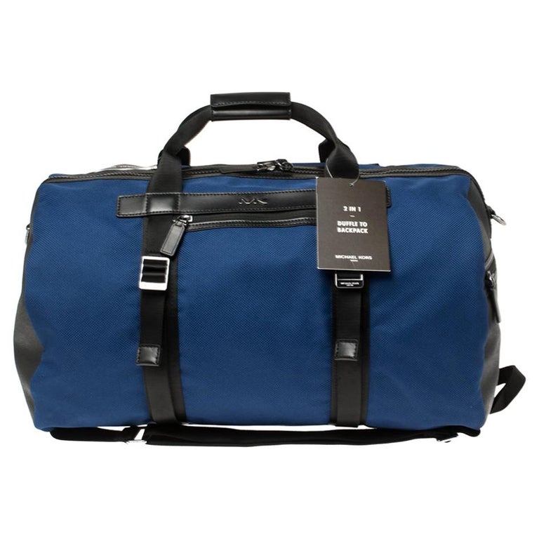 Michael Kors Sapphire Blue Nylon and Leather Convertible Backpack Duffle Bag 1stDibs | michael kors weekender bag, travel bag kors, mk weekender bag
