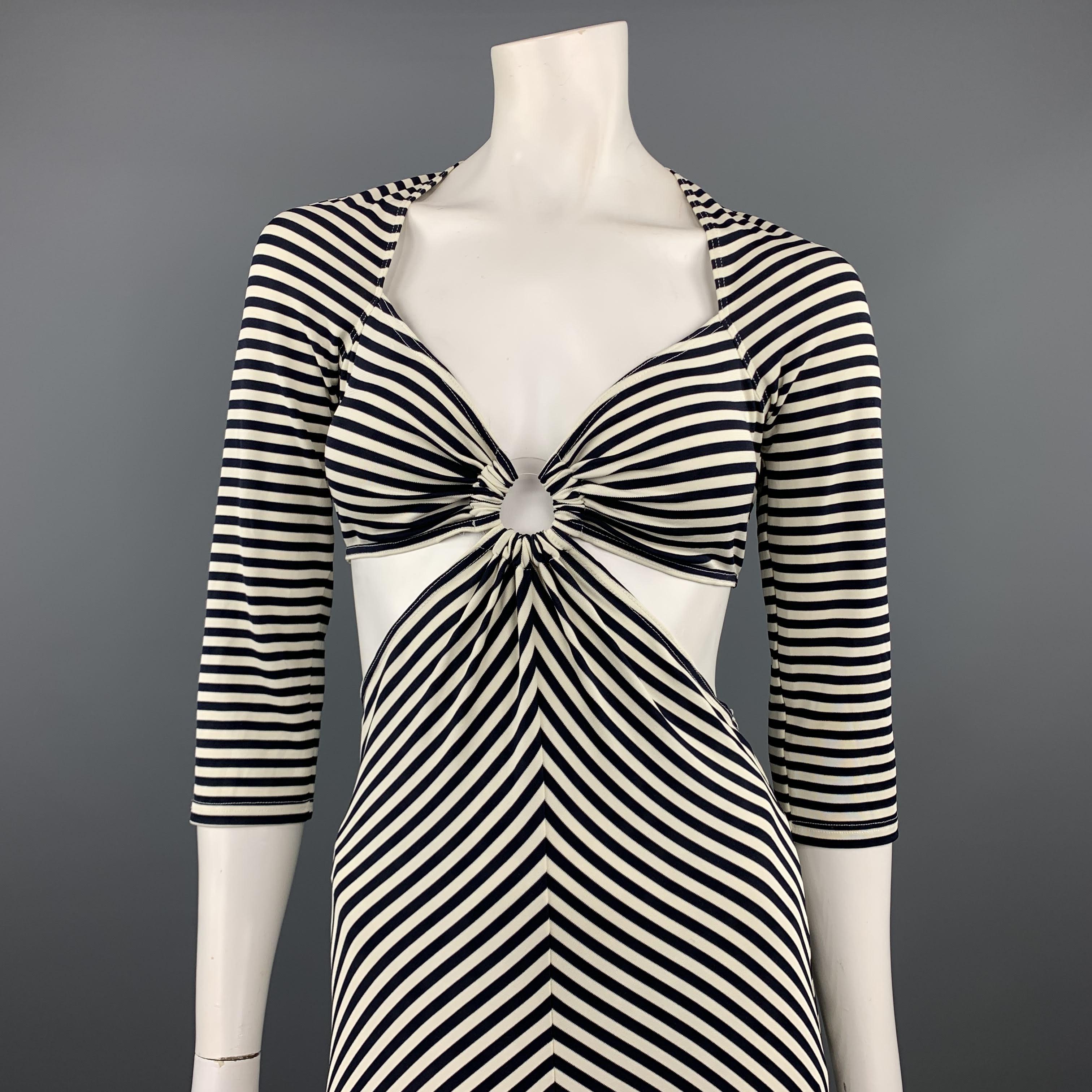 MICHAEL KORS dress comes in navy and white striped rayon jersey with a sweetheart bolero cut top and A line cutout skirt connected with clear bra hoop. Made in Italy.
 
Excellent Pre-Owned Condition.
Marked: 10
 
Measurements:
 
Shoulder: 15