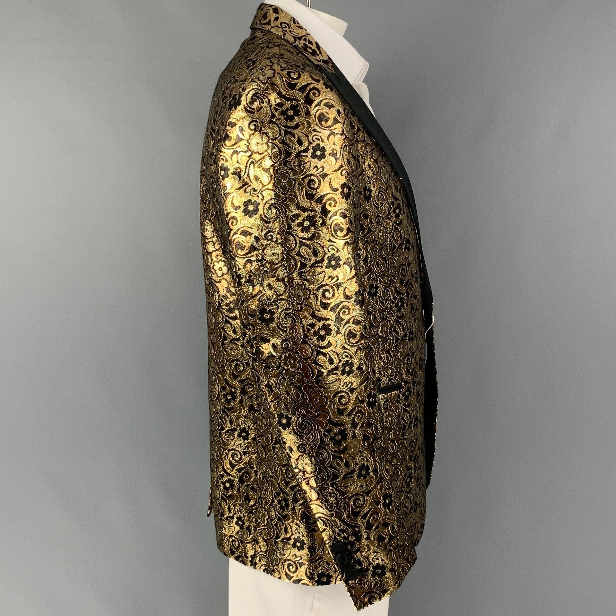 MICHAEL KORS sport coat comes in a black & gold jacquard polyester with a full liner featuring a peak lapel, slit pockets, single back vent, and a single button closure. Made in Italy.
New With Tags.
 

Marked:   46/56 R  

Measurements: 
