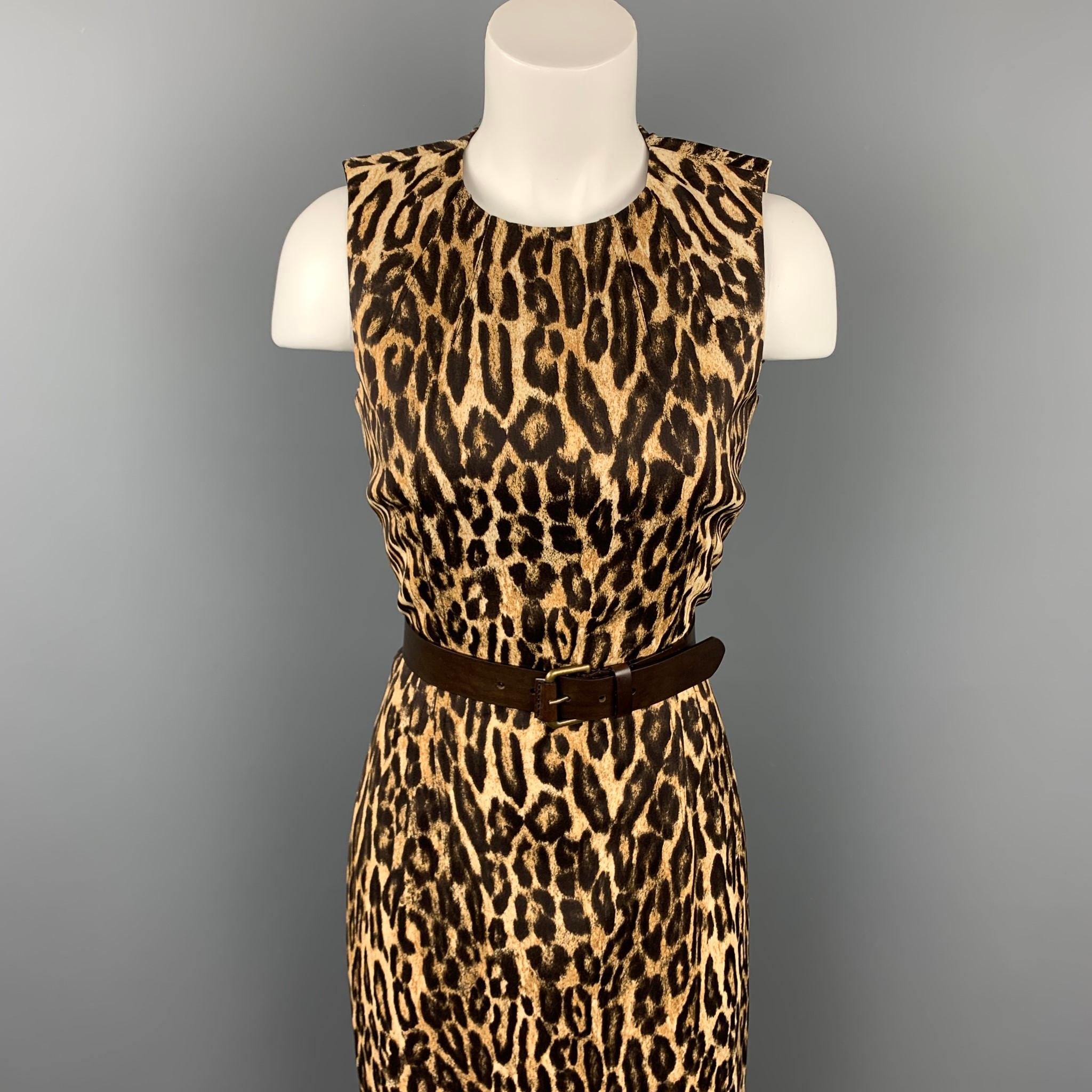 MICHAEL KORS dress comes in a brown leopard print rayon / spandex featuring a shift style, belted, and a back zip up closure. Made in Italy.

Very Good Pre-Owned Condition.
Marked:

Measurements:

Bust: 30 in.
Waist: 28 in.
Hip: 34 in.
Length: 41 in.