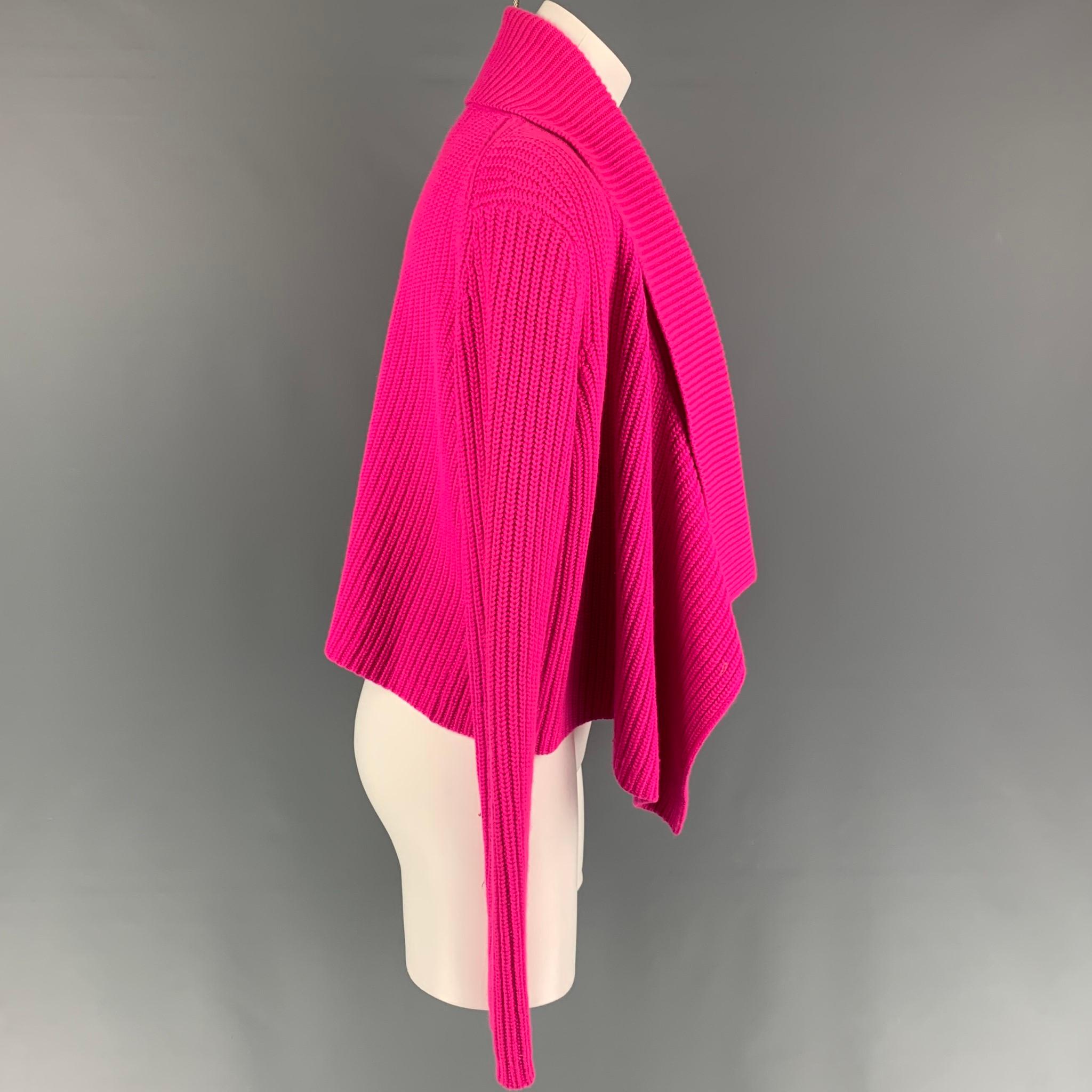 MICHAEL KORS cardigan comes in a pink knitted cashmere featuring a shawl collar and a open front. 

Very Good Pre-Owned Condition.
Marked: S

Measurements:

Shoulder: 17 in.
Bust: 38 in.
Sleeve: 28 in.
Length: 18 in. 