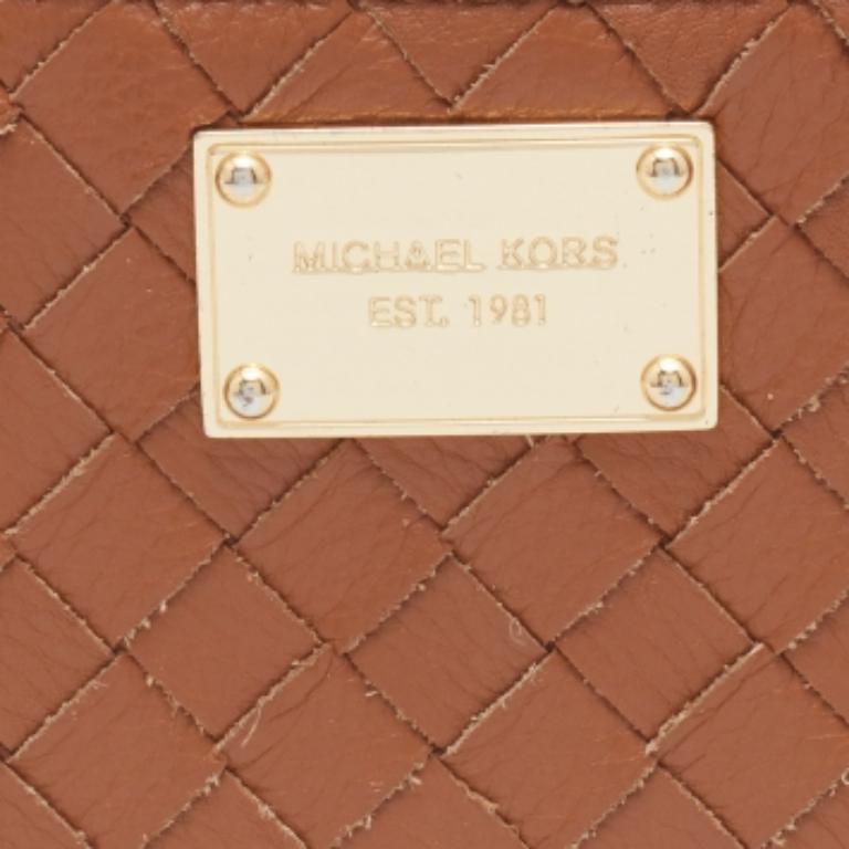 Michael Kors Portefeuille zippé en cuir fauve Pour femmes en vente