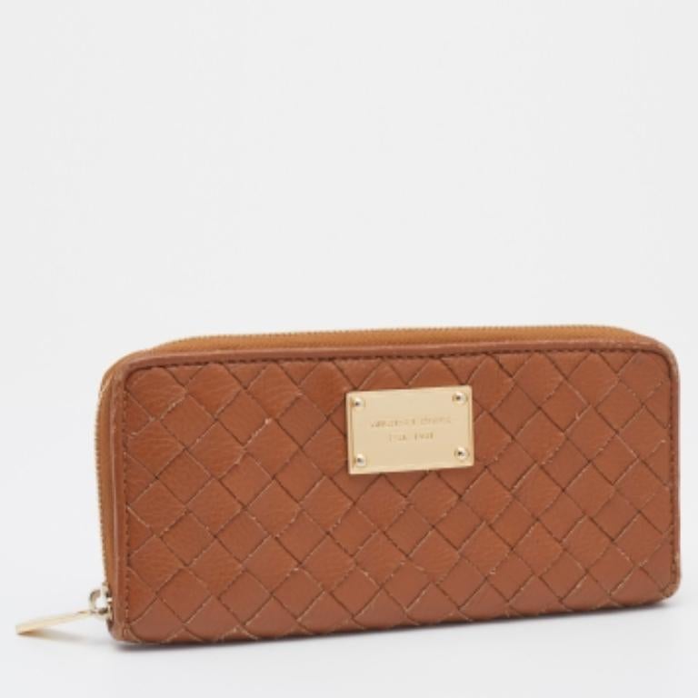 Michael Kors Portefeuille zippé en cuir fauve en vente 1
