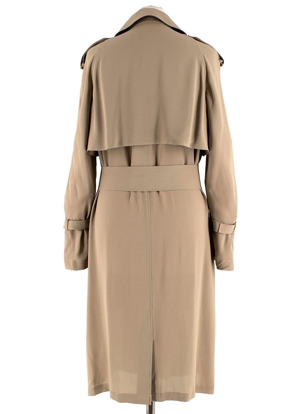 Michael Kors Tan Trench Duster

- Hidden buttons
- Classic trench coat details
- Flowy
- Light weight

Materials:
- 100% Silk
Lining 
- 65% Acetate
- 35% Rayon

Professional dry cleaning
Made in Italy

