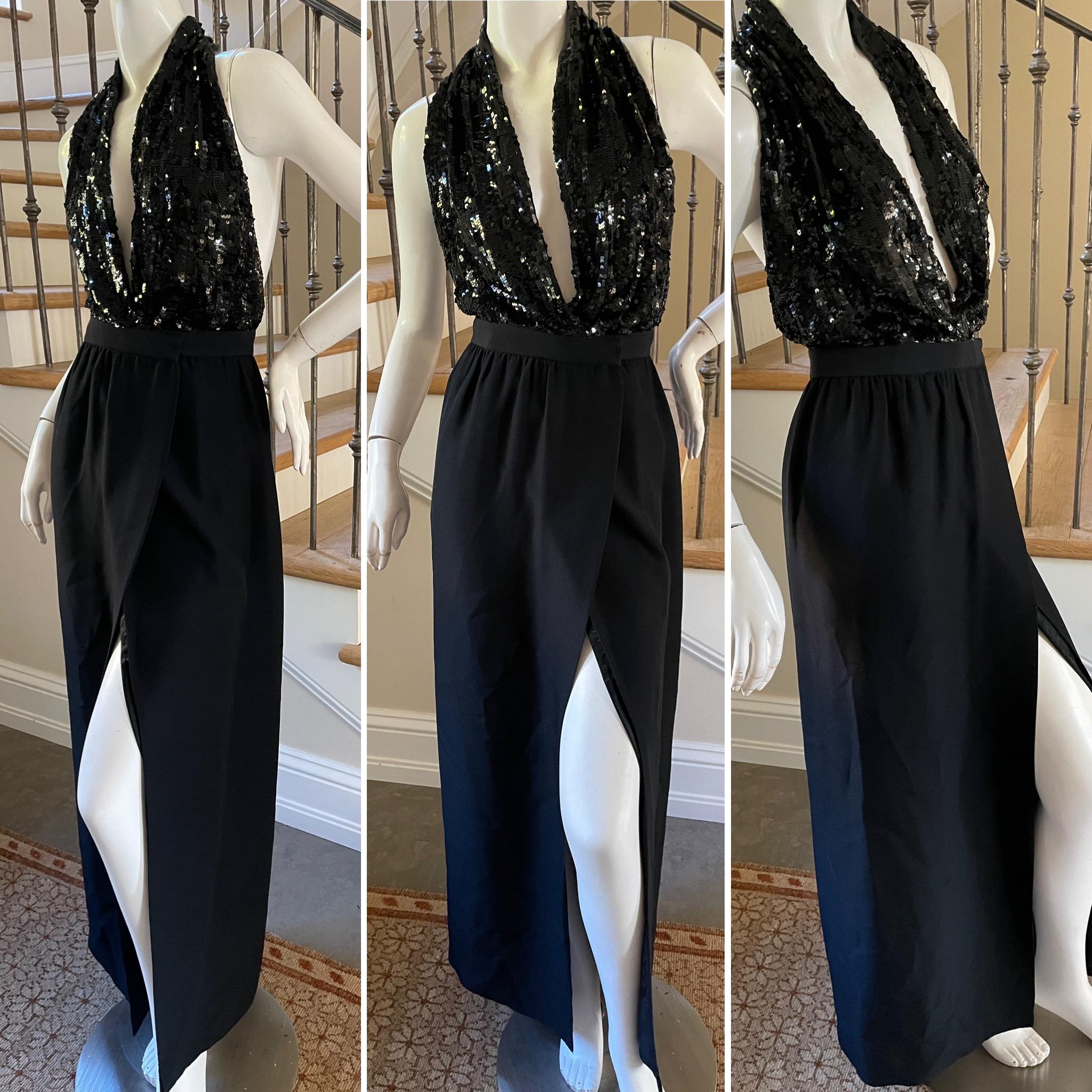 Michael Kors Vintage 90's Black Sequin Plunging Wrap Style Halter Dress.
American Fashion at it's best.
Size 6
  This is so pretty, looks better on live model.
 Bust 36