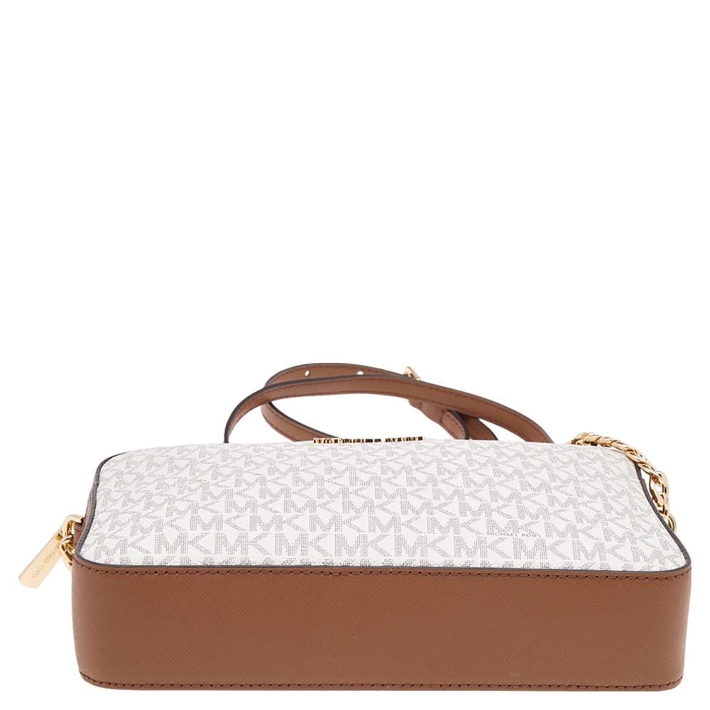 white and brown michael kors purse