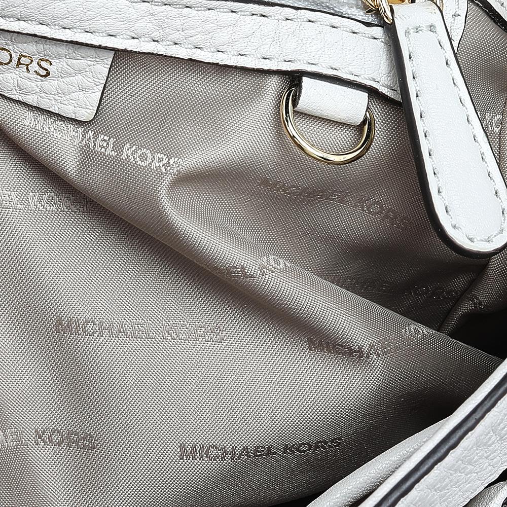 A fine choice of a leather bag is this one from Michael Kors. The bag has a nylon-lined interior, a top handle, and gold-tone hardware. It will make a prized buy as it will last you for many years.

