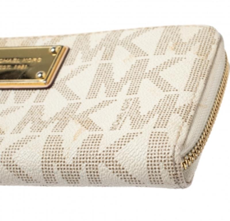 Michael Kors White Monogram Coated Canvas Zip Around Wallet For Sale 1