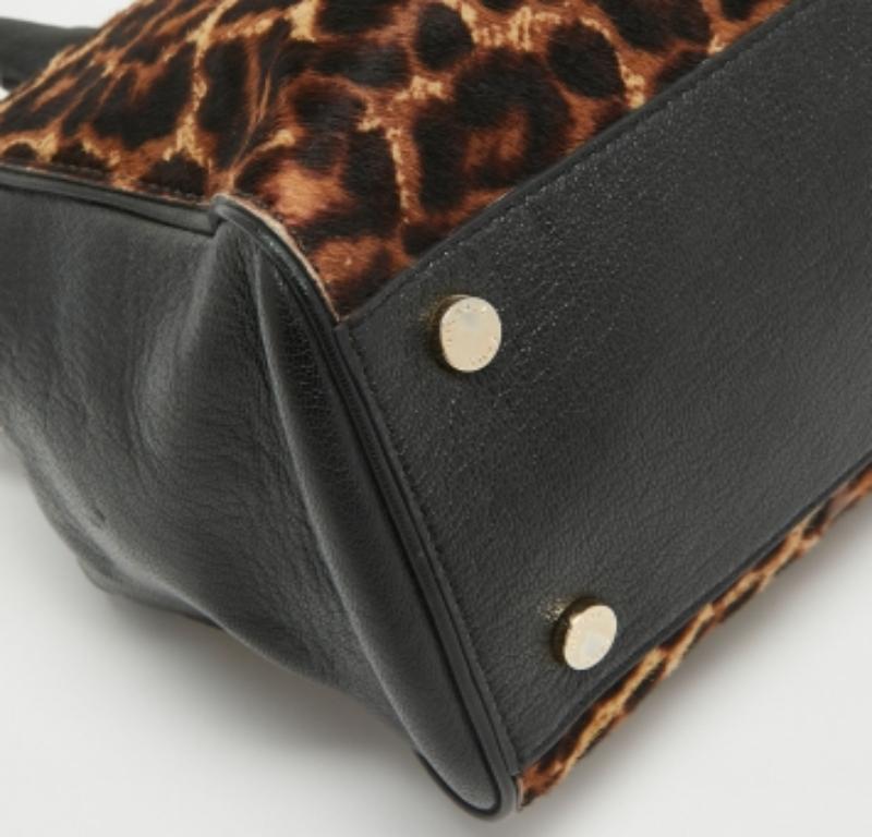 Nero Michael Kors - Tote Astrid in pelle e pelliccia di vitello con stampa leopardo nero/marrone in vendita
