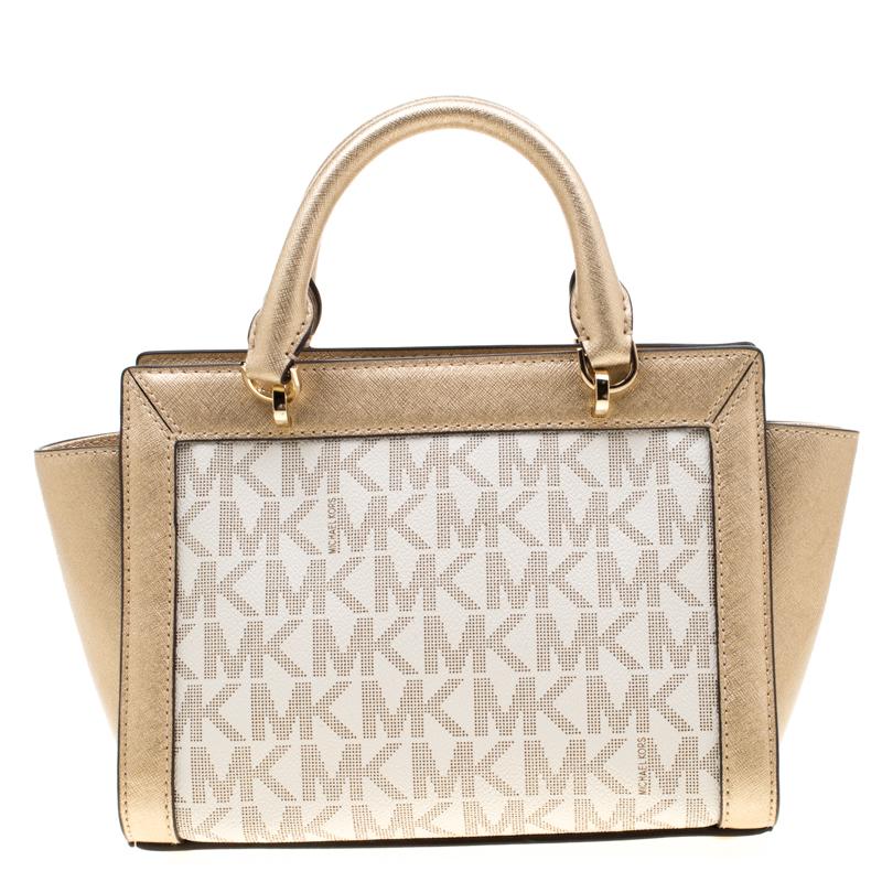 This signature coated canvas and leather tote is apt for multiple events. With an expertly lined fabric interior, this can accommodate all your essentials. This piece, from MICHAEL Michael Kors, is the note on utility and designing.

Includes: The