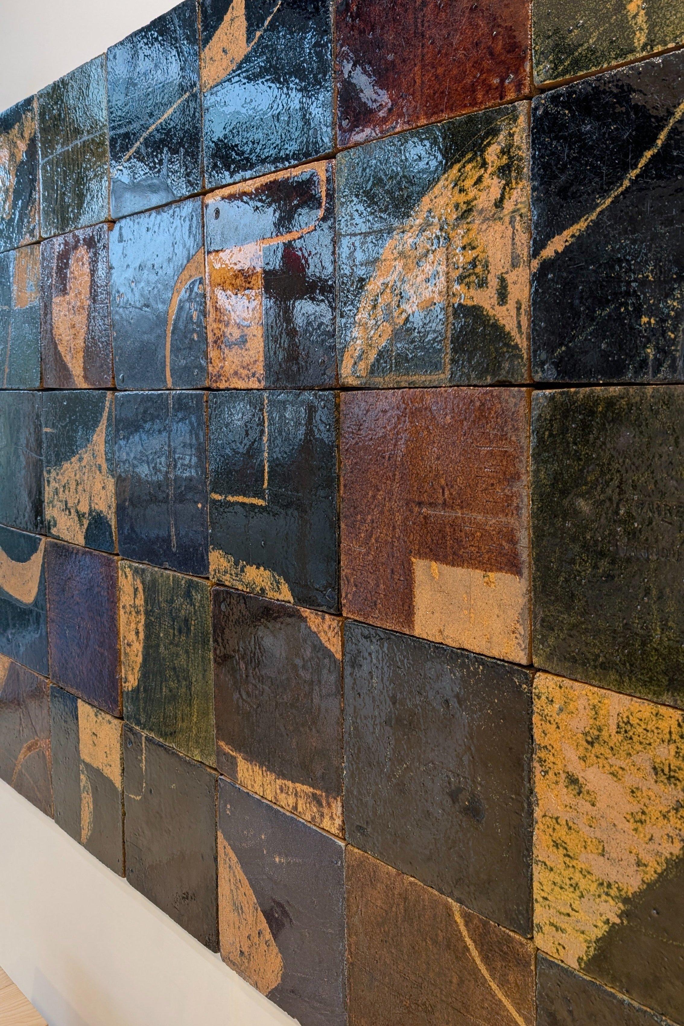 Created in 1962, this monumental mural weighs 400 pounds and spans forty square feet. Originally scattered across 