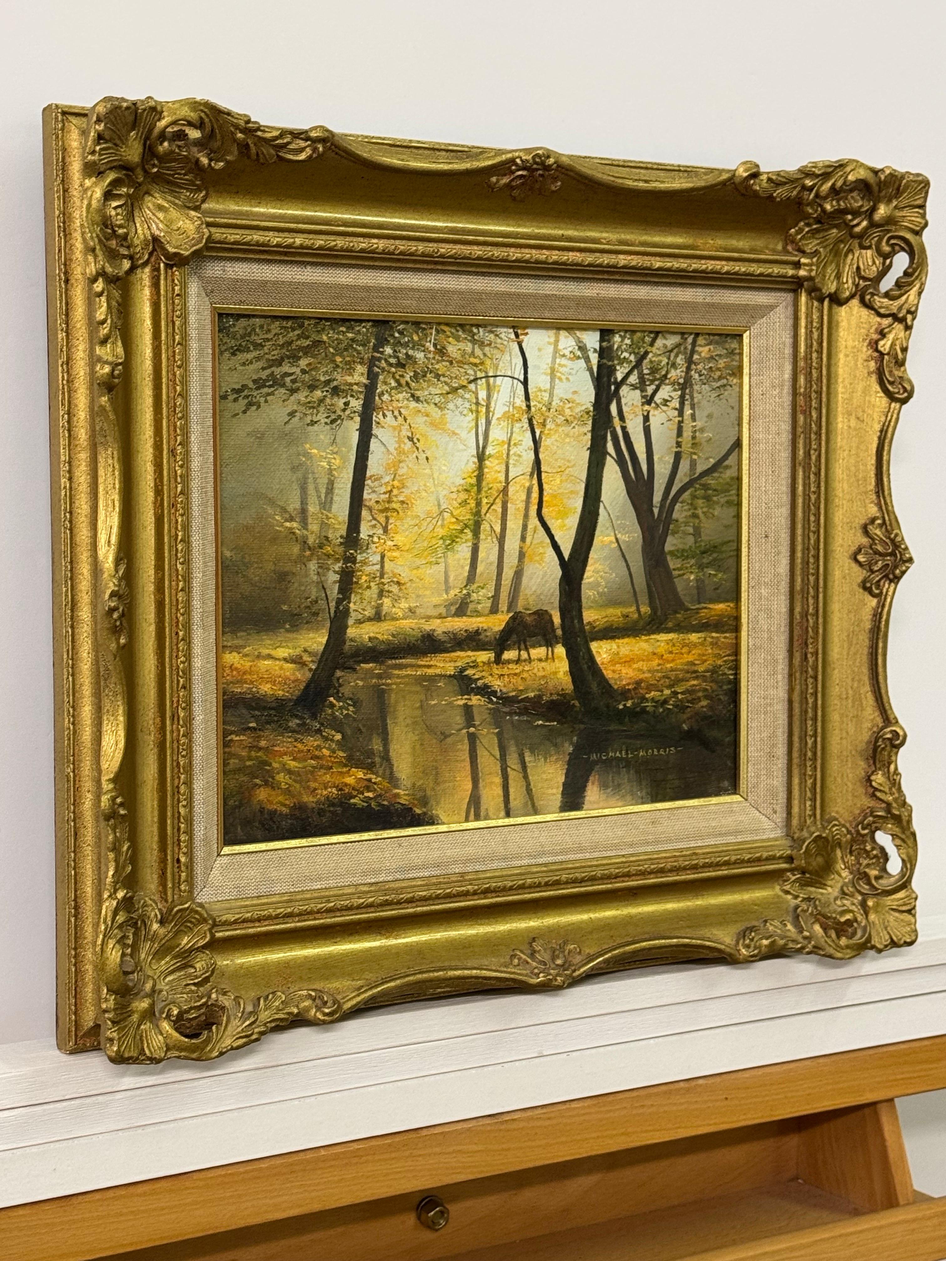 Caballo junto al río en el bosque de la campiña inglesa por un artista británico - Painting de Michael Morris