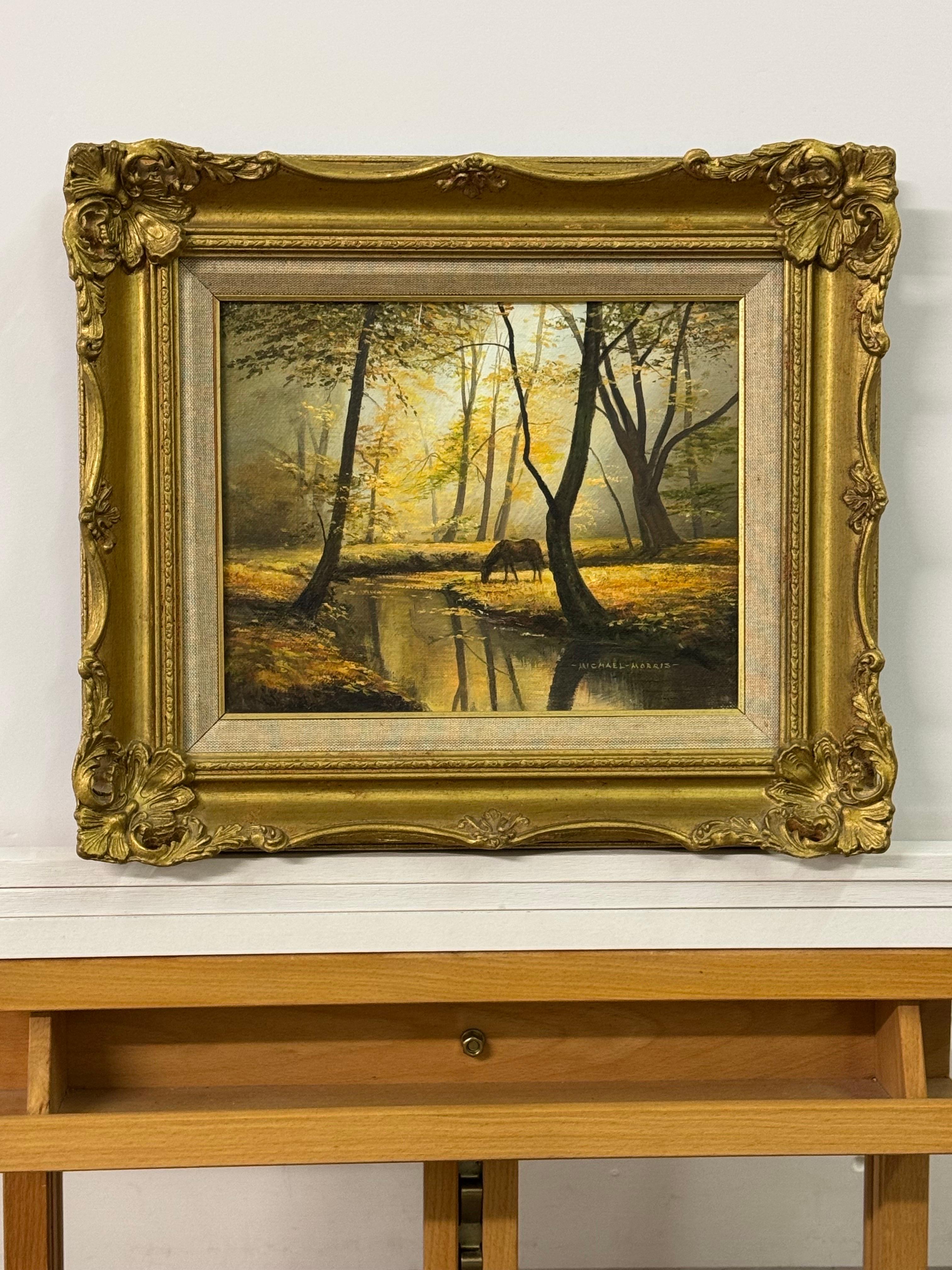 Caballo junto al río en el bosque de la campiña inglesa por un artista británico - Painting Realista de Michael Morris