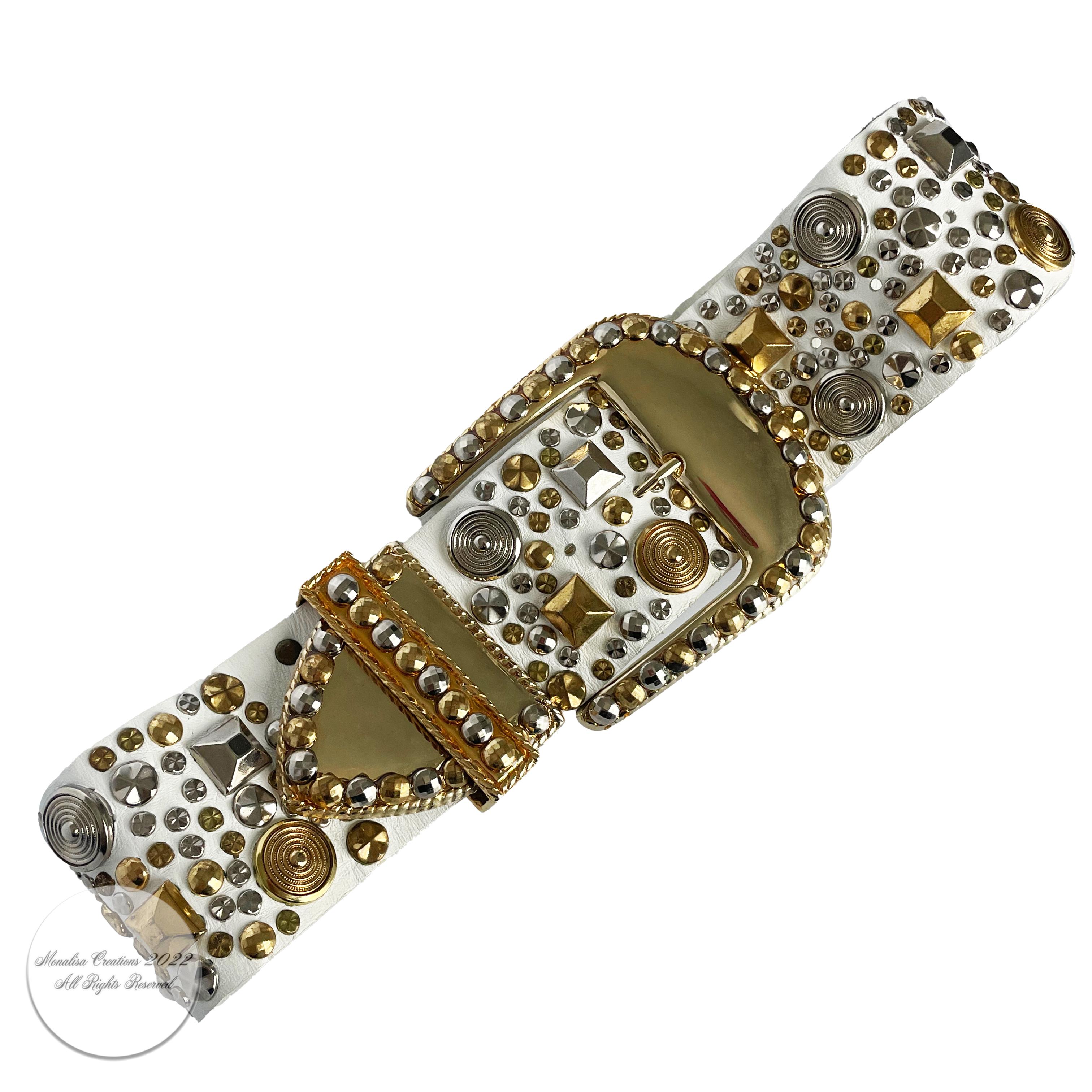 Vintage wide leather belt with studs, made by Michael Morrison MX most likely in the early 80s.  Definitely a rock-n-roll vibe with this piece! Made from white leather, it's embellished with brass and silver metal studs in various shapes and sizes. 