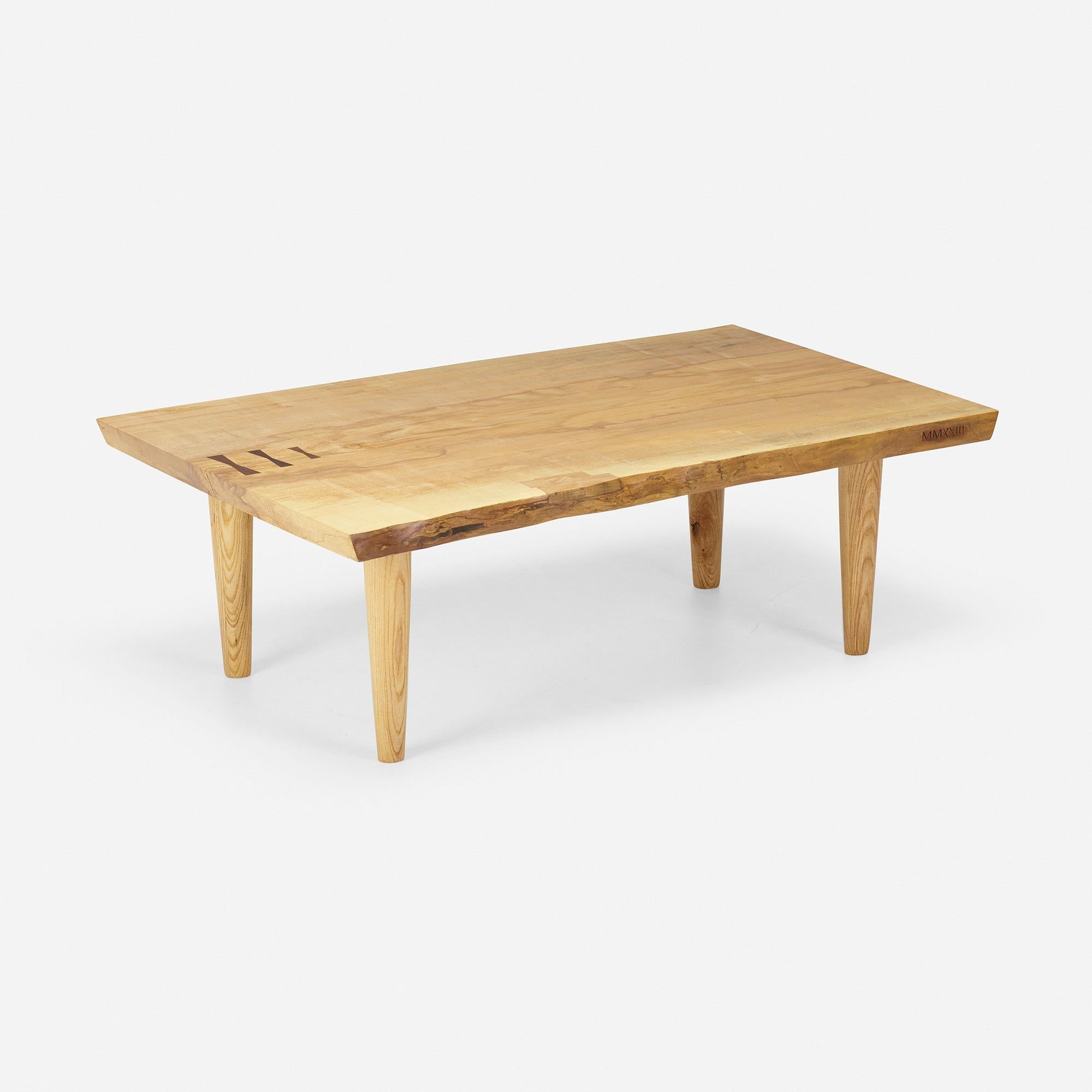Hand crafted live edge slab coffee table. Made from highly figured wood with a variety of wood species choice. The table is designed and made by designer Michael Oates. Drawing its influence from the New Hope area and its neighboring river towns,