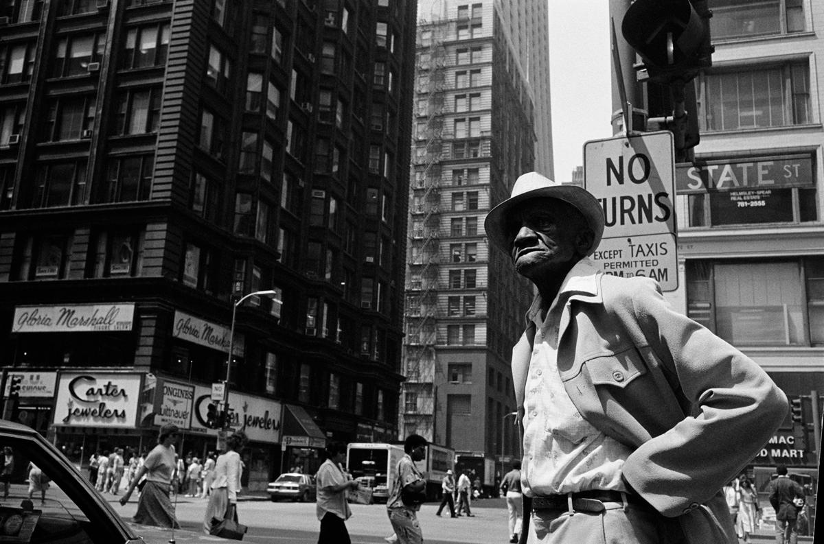 Michael Ormerod Portrait Photograph - African American Man on Street - 20th Century, America, Street photography