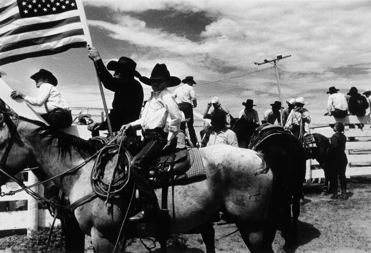 Michael Ormerod Portrait Photograph - Boy and Men on Horses - Cowboys, America, 20th Century, Portrait photography