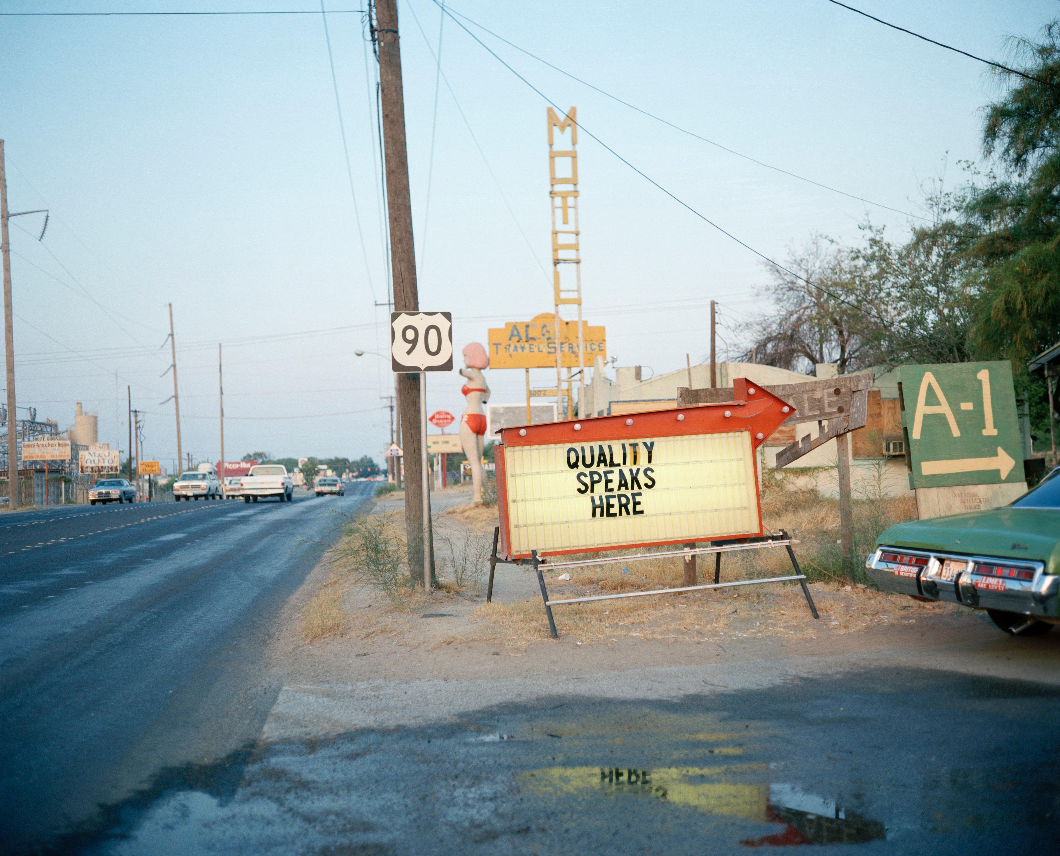 Michael Ormerod Color Photograph - Giant Women Signs - Color Print on Hahnemuhle Paper