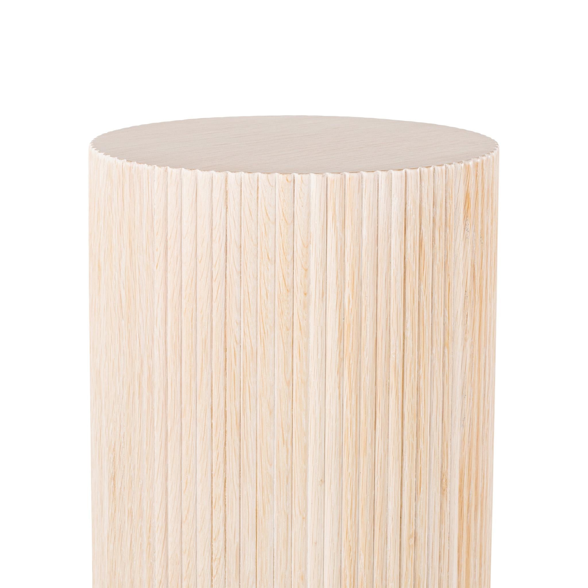 Designed by Josh Greene.
Reeded round pedestal made of oak. 