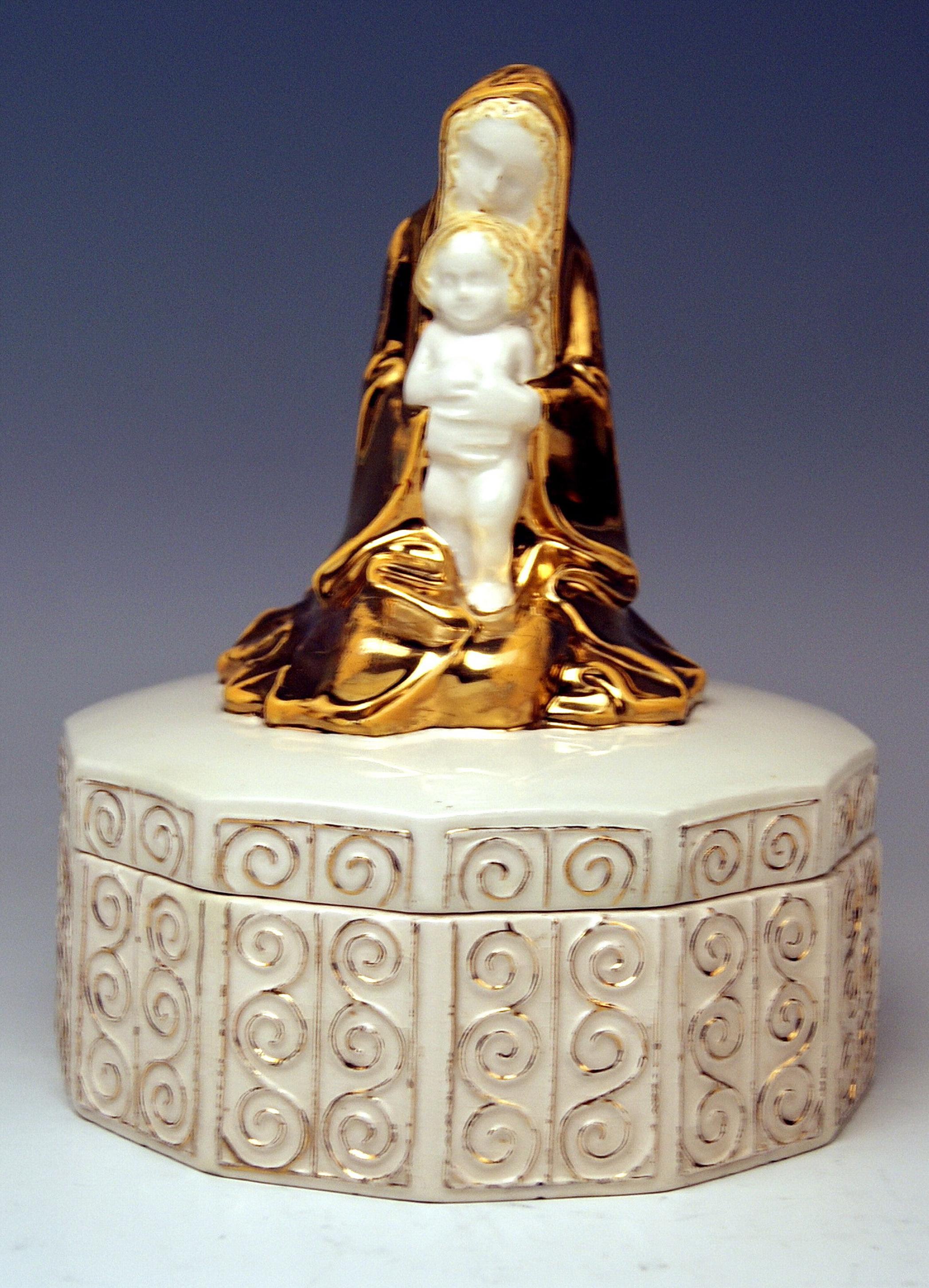 Michael Powolny excellent Art Nouveau item:
Virgin Mary with Jesus Child attached to twelve-sided box. It is a most lovely ceramics item, indeed  !
Modelled by Michael Powolny  1871 - 1954,   before 1910.

HALLMARKED:
Manufactured by Wiener Keramik: