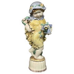 Antique Michael Powolny Austrian Ceramic Sculpture of Putto with Flowers, “Summer”