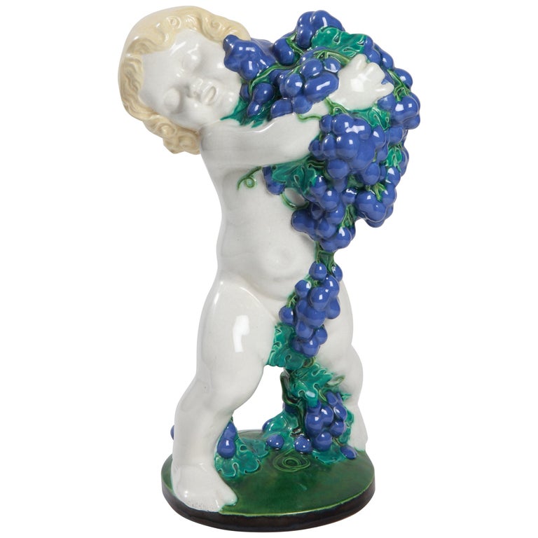 Michael Powolny Putto with Bunch of Grapes, "Autumn" from the "Four Seasons" For Sale