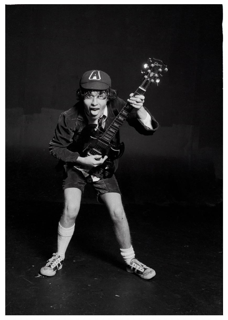 Angus Young AC/DC 1976 - Photograph de Michael Putland