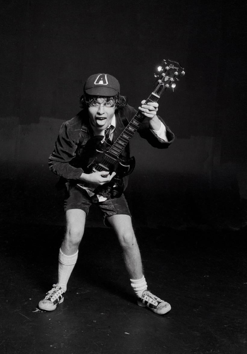 Black and White Photograph Michael Putland - Angus Young AC/DC 1976