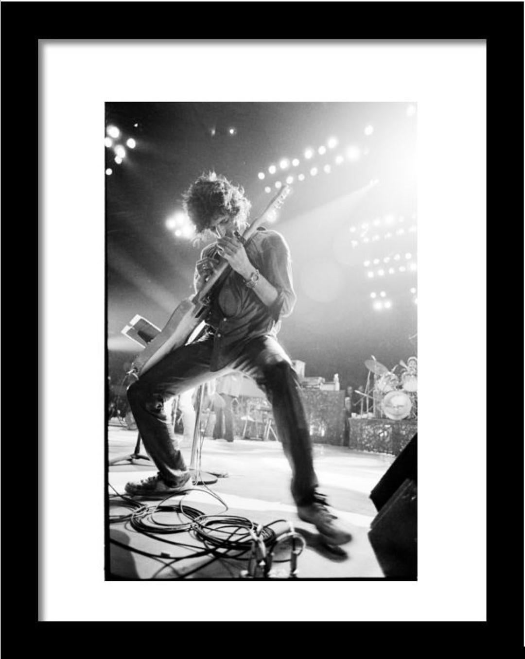 Keith Richards performs on stage with the New Barbarians at Madison Square Garden, New York, 7th May 1979. He plays a Fender Telecaster using a tapping technique. 

Silver Gelatin print from the original transparency held at the Getty Images