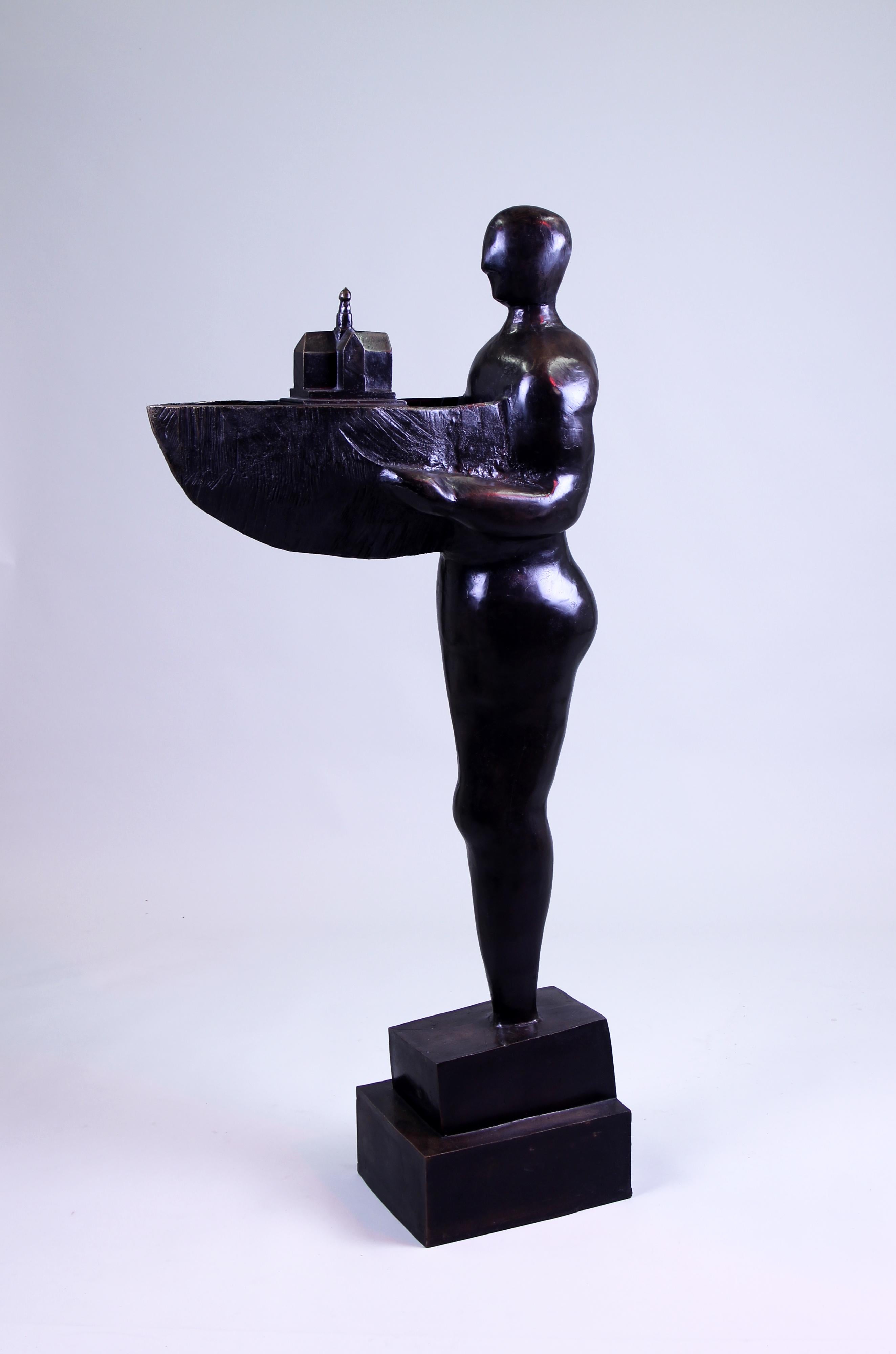 MICHAËL RIEU (Born in 1953)
The Great Travel, 1990

Signed and dated 1990, justified EA
Measure: Height : 142 cm


Patinated bronze group depicting a figure holding the prow of a ship on which rests a church.

This piece is reproduced in